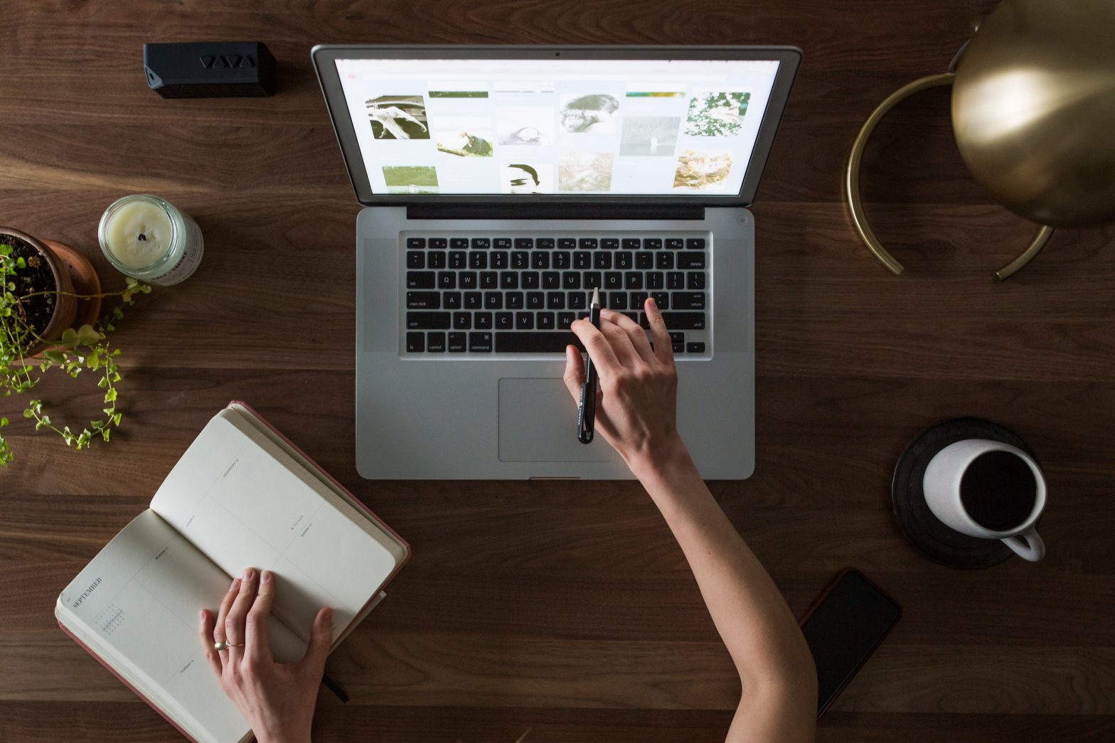 Person with computer on desk